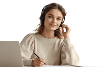 Smiling woman with headset working on laptop.