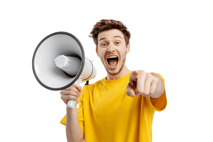 Young man shouting into megaphone, pointing at viewer. Announcement, news, advertisement concept.