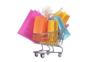 Colorful shopping bags overflowing from a mini shopping cart914.