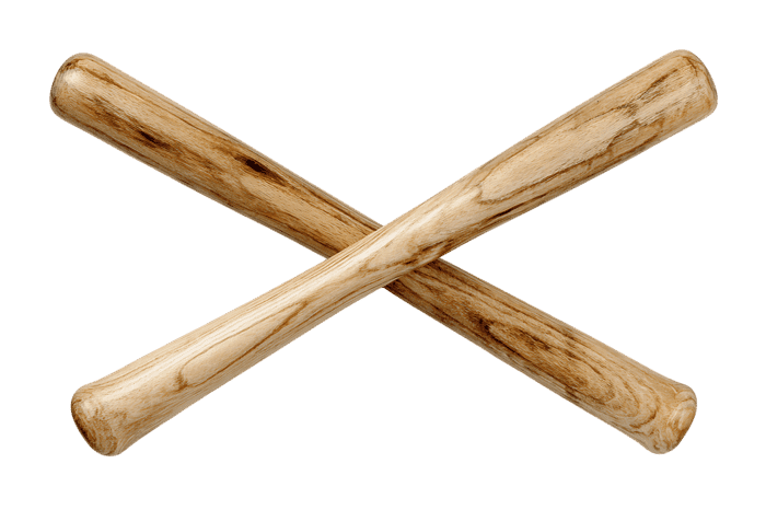 Pair of crossed wooden clubs, isolated on black background.