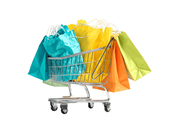 Shopping cart full of colorful shopping bags.