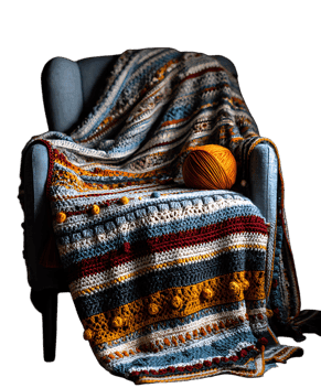 Cozy handmade blanket in warm autumnal colors