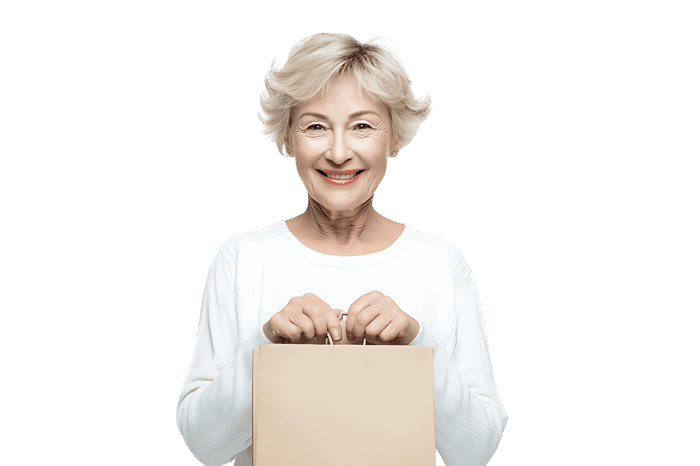 Happy senior woman holding a shopping bag