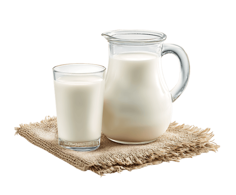 Glass and pitcher of fresh milk