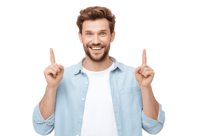 Happy man pointing up with both index fingers.