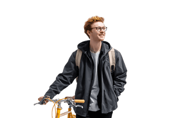 Smiling man with his bicycle promoting sustainable urban transport.
