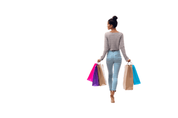 Woman walking away with shopping bags.