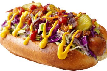 Loaded hot dog with coleslaw, bacon, and mustard.