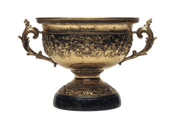 Ornate gold trophy cup on black background.
