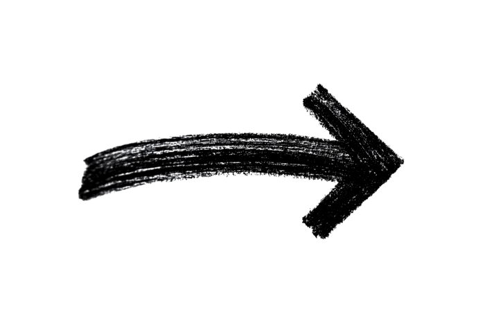 Dark charcoal arrow pointing right.