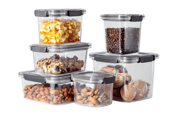 Stack of clear plastic food containers filled with various snacks.