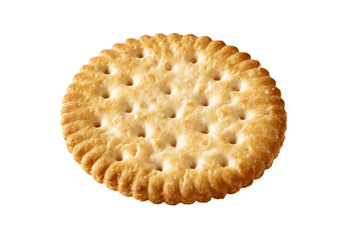 Single round cracker isolated on black background
