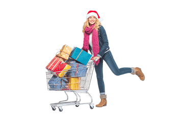 Happy woman with shopping cart full of Christmas gifts.