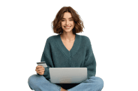 Smiling woman using laptop and credit card for online shopping.