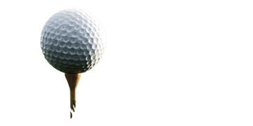 Golf ball on tee against dark background, ready for the first drive.