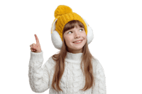 Cute girl in winter hat and earmuffs pointing upwards, suggesting an idea or looking at something interesting.