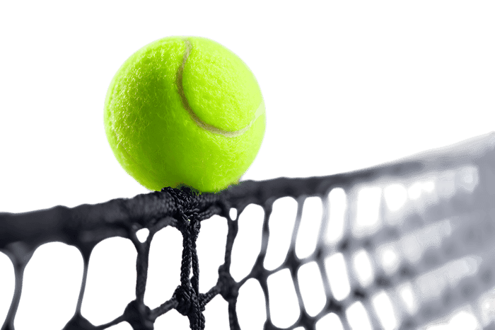 Close up of tennis ball on racket strings ready for action