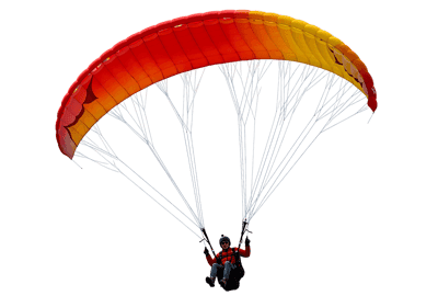 Paraglider soaring through the air