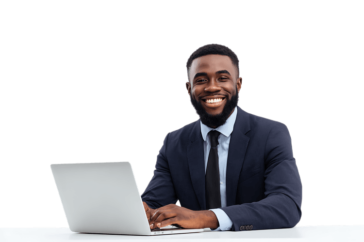 Happy African American businessman working on his laptop.