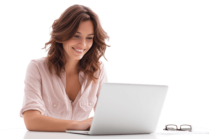 Smiling woman working on laptop