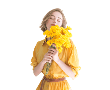 Serene woman in yellow dress enjoying fragrance of yellow flowers. Spring, beauty, joy.
