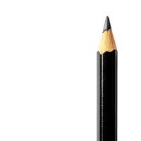 Close up of a sharpened black pencil against a black background.