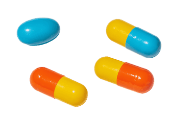 Colorful capsules on a black background