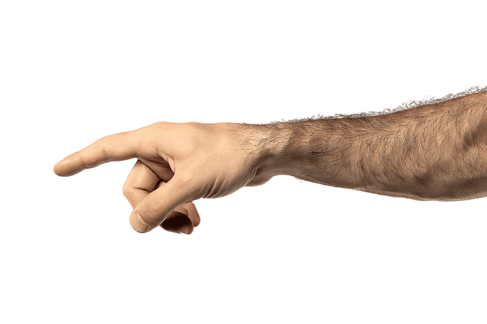 Close up of a male hand pointing to the left.