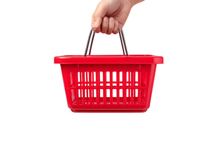 Close up of a hand holding an empty red shopping basket.