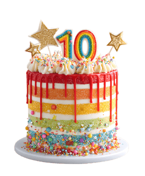 Rainbow drip cake with 10th birthday candles.