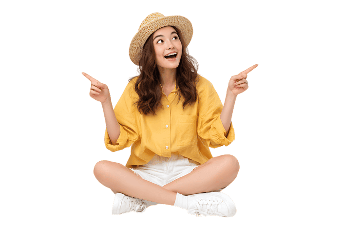 Excited young woman pointing upwards, summer style