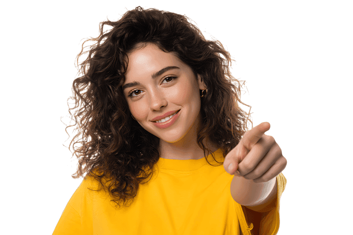 Young woman pointing her finger at you. You're chosen!