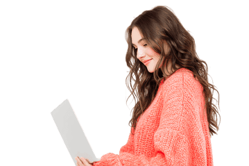 Young woman using a laptop, smiling.