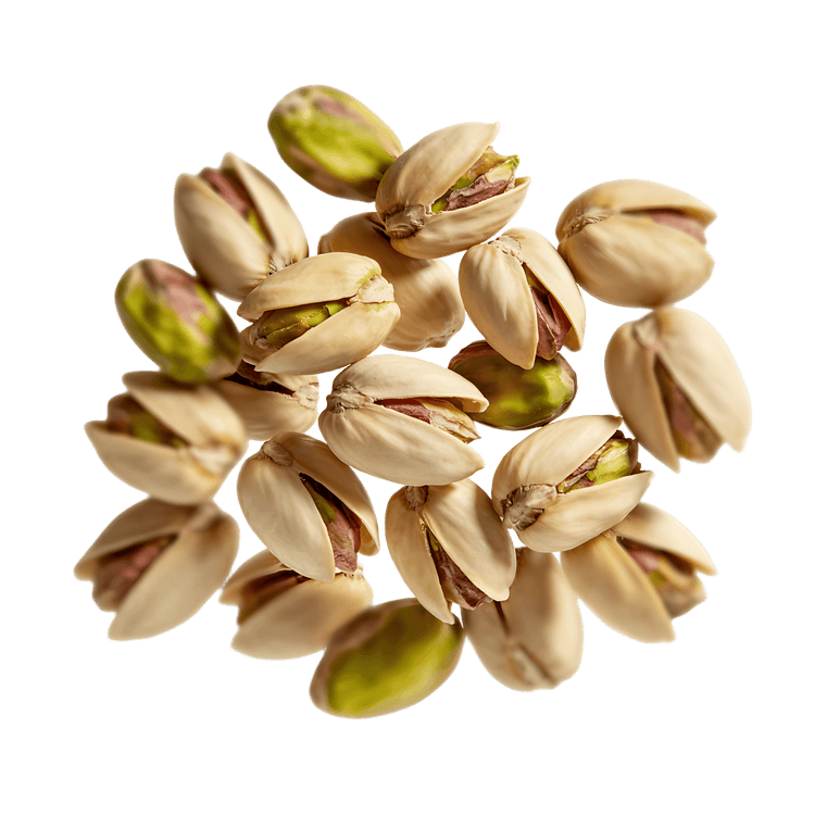 Pile of roasted pistachios, shelled and ready to eat.