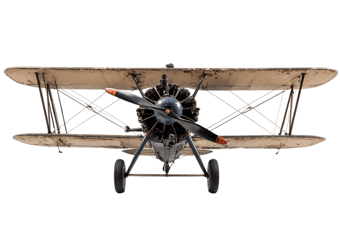 Vintage biplane aircraft, front view, isolated on black background.