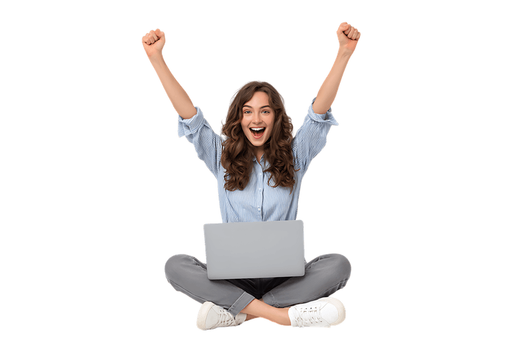 Happy woman celebrating success on laptop