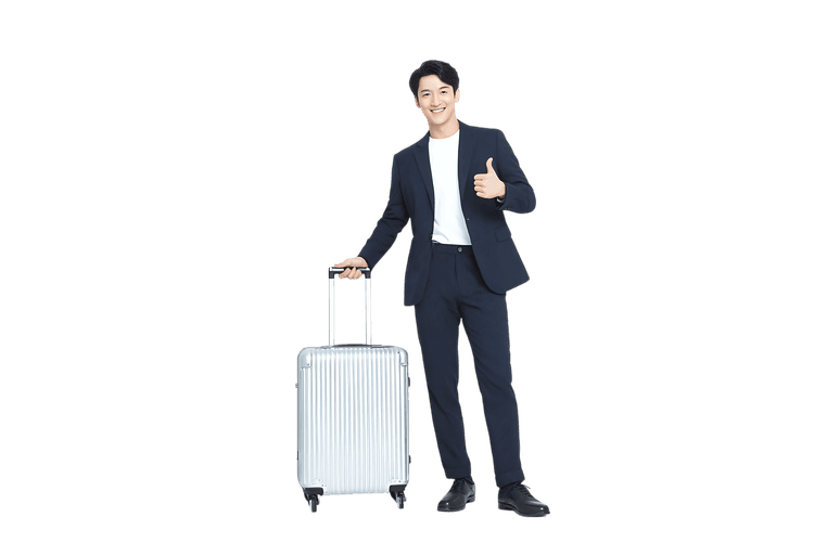 Businessman with luggage giving thumbs up