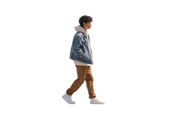 Young man walking in casual denim jacket and corduroy pants
