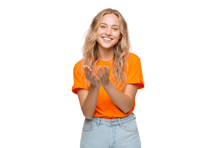 Cheerful blonde woman clapping hands, expressing joy and appreciation.