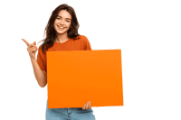 Smiling woman pointing at a blank orange sign.