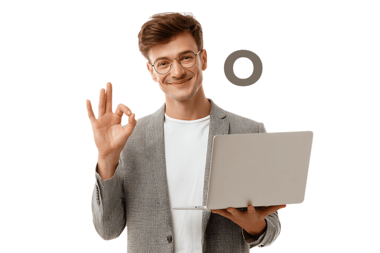 Smiling man in suit holding laptop, showing OK gesture.