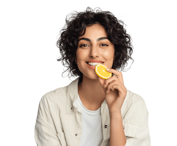 Smiling woman holding a lemon slice, promoting health, vitamin C, and freshness.