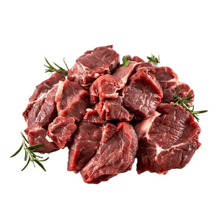 Close up of raw beef stew meat with rosemary sprigs.