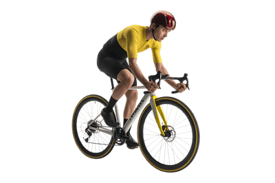 Male cyclist riding road bike in racing gear and helmet