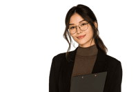 Portrait of a fashionable young woman with glasses on a black background.
