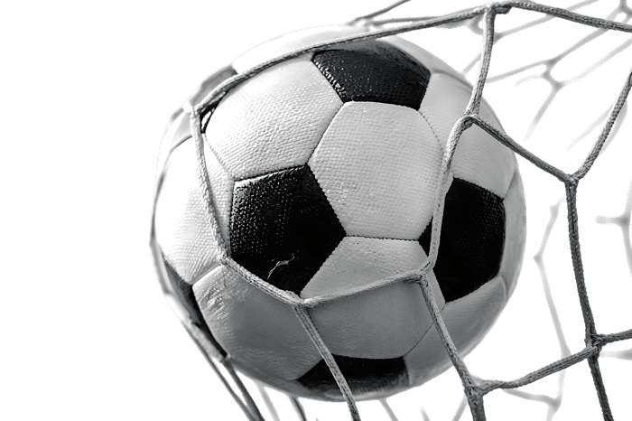Soccer ball in net goal victory success