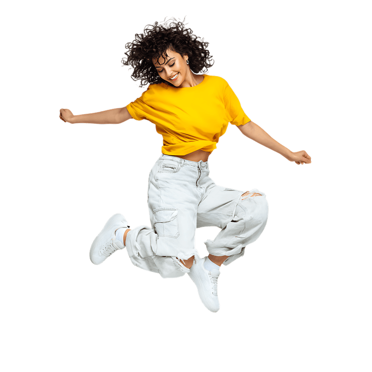 Carefree woman leaps with exuberance, expressing freedom and happiness.