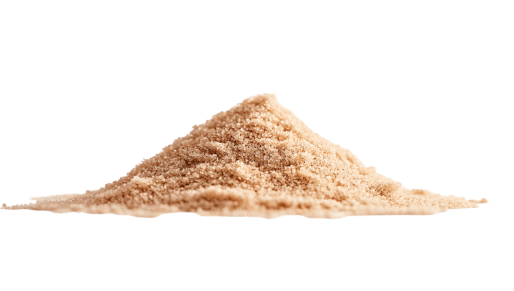 Pile of light brown powder on black background