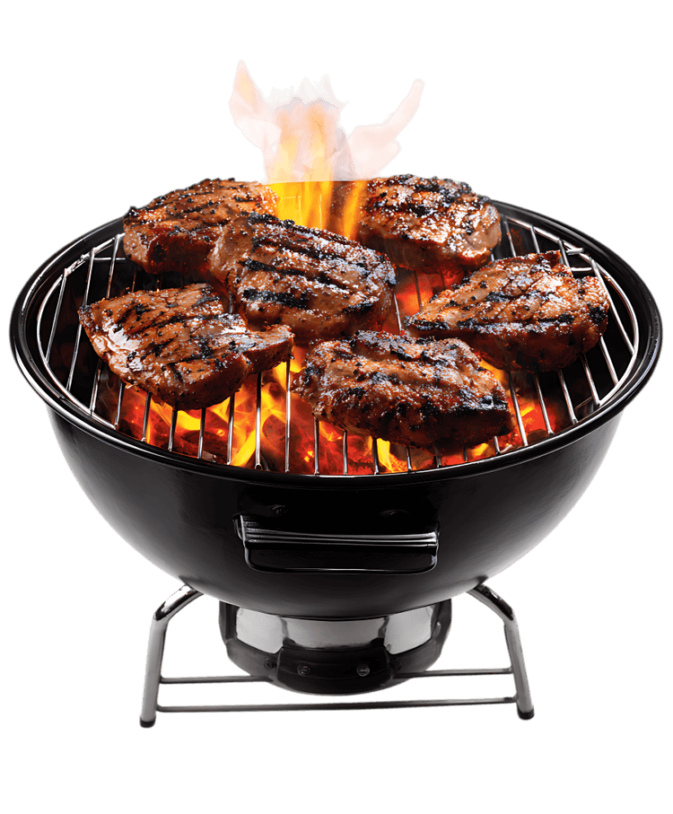 Sizzling steaks on a fiery grill.