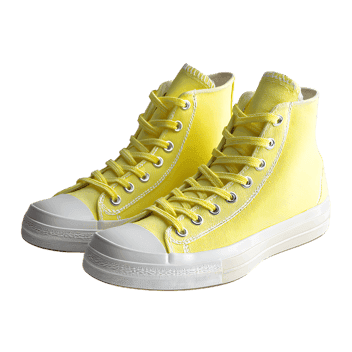 Stylish yellow high top sneakers on a plain background